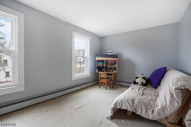 bedroom featuring carpet and a baseboard radiator