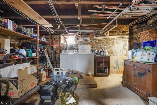 unfinished basement with washer and dryer