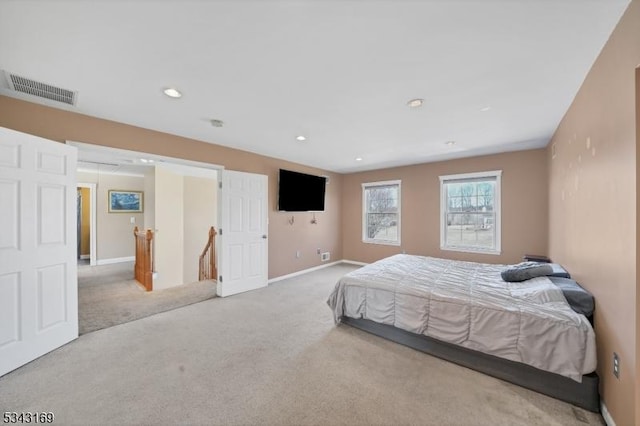 bedroom featuring recessed lighting, carpet, visible vents, and baseboards