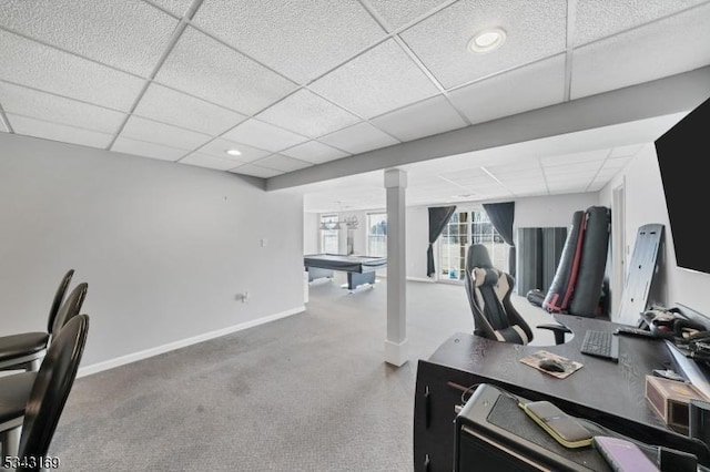 office space featuring a drop ceiling, pool table, baseboards, and carpet floors