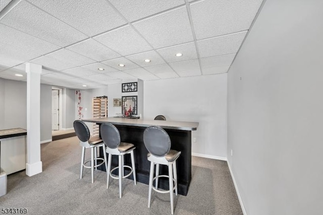 bar featuring recessed lighting, baseboards, carpet floors, and a dry bar