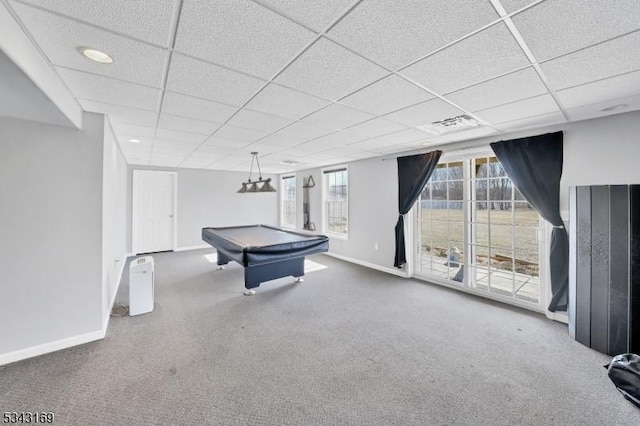 game room with a paneled ceiling, baseboards, and carpet floors