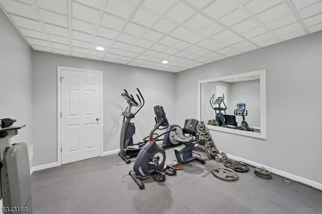 workout room featuring recessed lighting and baseboards