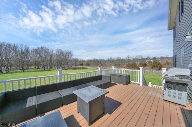 deck with a yard and an outdoor living space with a fire pit