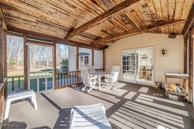 sunroom / solarium with lofted ceiling and wood ceiling
