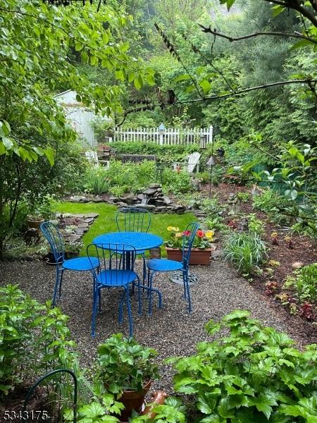 view of yard featuring a patio area and fence