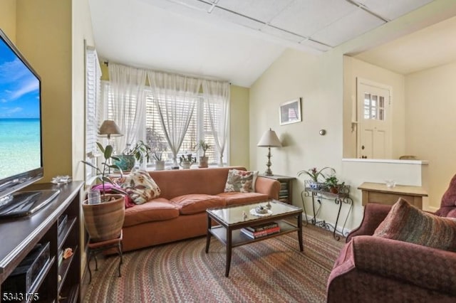 living room with vaulted ceiling