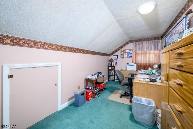 carpeted home office with baseboards, a textured ceiling, and vaulted ceiling