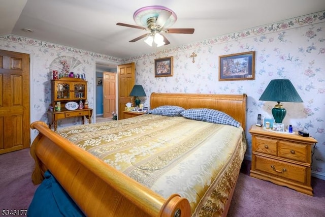 bedroom featuring wallpapered walls, carpet, and ceiling fan