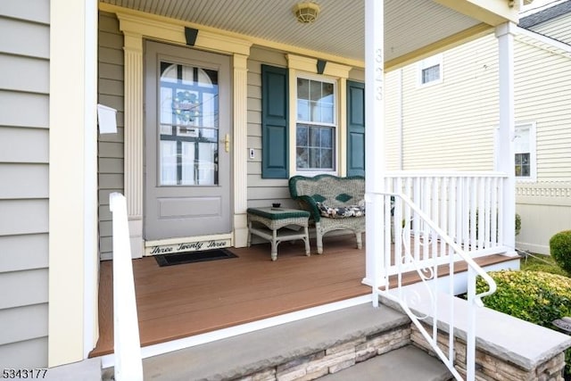 doorway to property with a porch