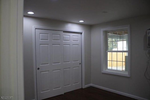 entrance foyer with recessed lighting, baseboards, and dark wood-style floors