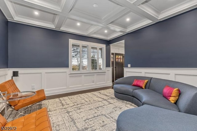 living room with wainscoting, beamed ceiling, recessed lighting, and coffered ceiling