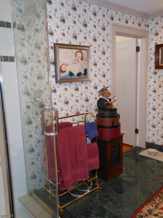 living area featuring ornamental molding and wallpapered walls