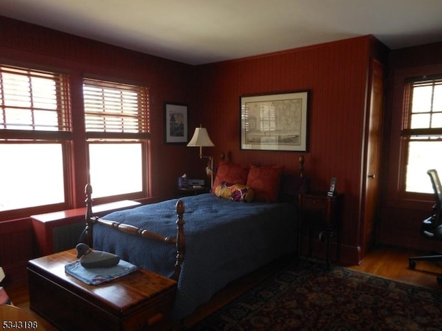 bedroom featuring wood finished floors