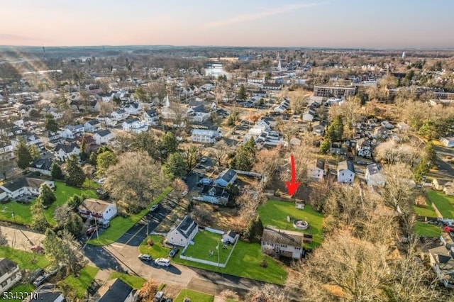 aerial view at dusk with a residential view