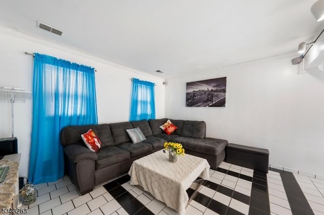 tiled living room with visible vents