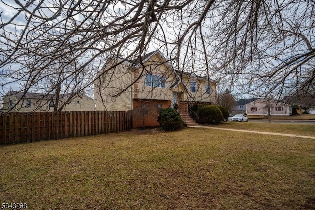 view of yard with fence