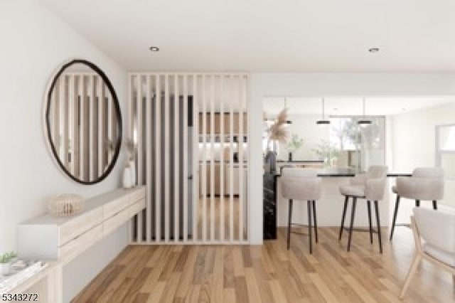 dining space with light wood finished floors