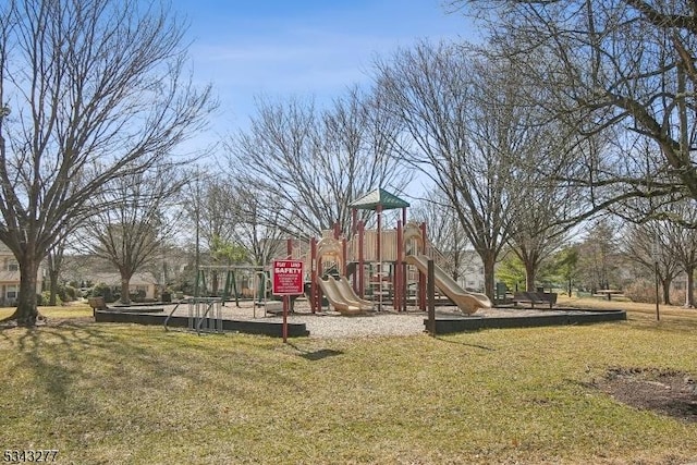 community play area with a lawn