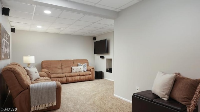 living room featuring light carpet, recessed lighting, a paneled ceiling, and baseboards