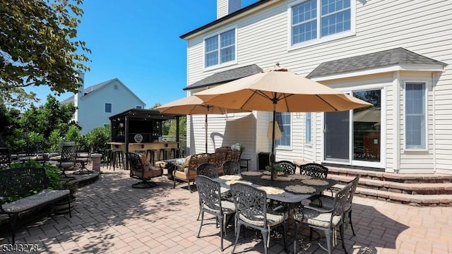 view of patio / terrace featuring outdoor dining area and outdoor dry bar