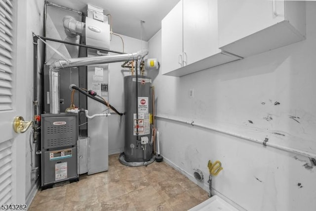 utility room featuring gas water heater