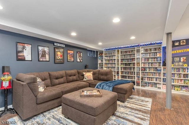 living area with recessed lighting and wood finished floors