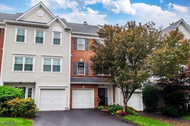 3 Knox Ct, Bernards Twp, NJ 07920 - view of property with asphalt driveway, a garage, and brick siding