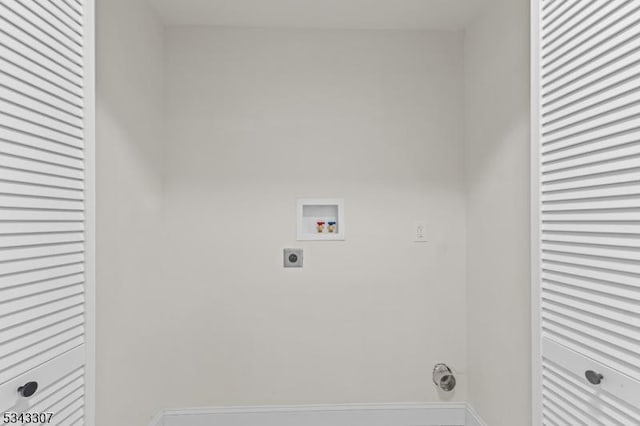 laundry room with electric dryer hookup and washer hookup