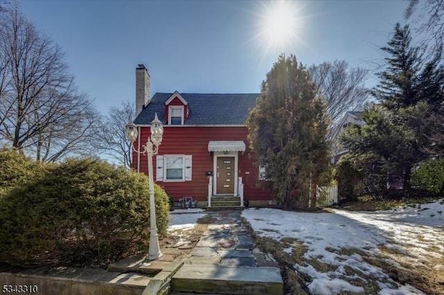 view of front of house with a chimney