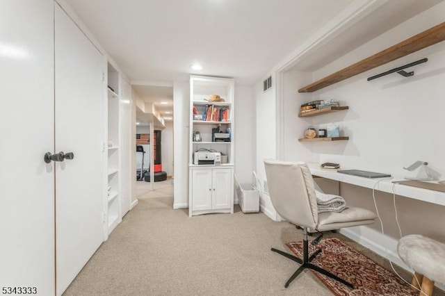 office with recessed lighting, visible vents, light colored carpet, and built in study area