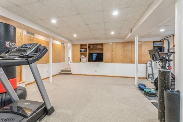 exercise room featuring recessed lighting, visible vents, and baseboards