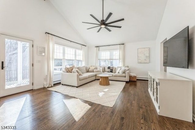 unfurnished living room featuring a ceiling fan, wood finished floors, a baseboard radiator, and high vaulted ceiling