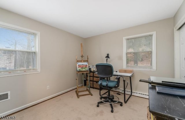 home office featuring visible vents, baseboards, carpet, and a baseboard radiator