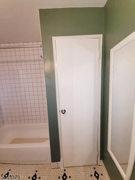 full bathroom with tile patterned floors