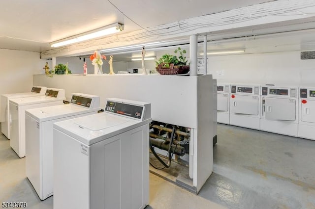 shared laundry area featuring separate washer and dryer