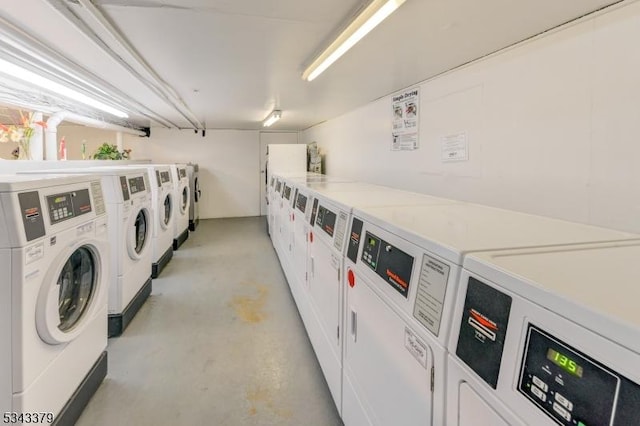 shared laundry area featuring washer and dryer