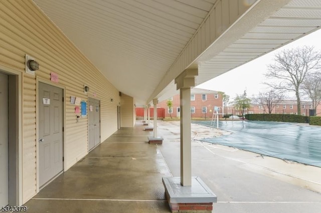 view of patio / terrace featuring fence