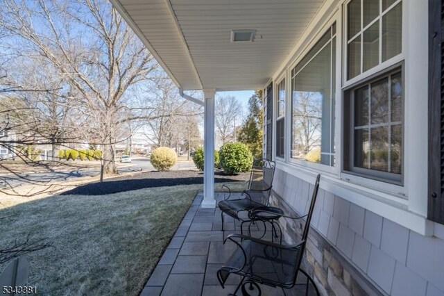 view of patio featuring a porch