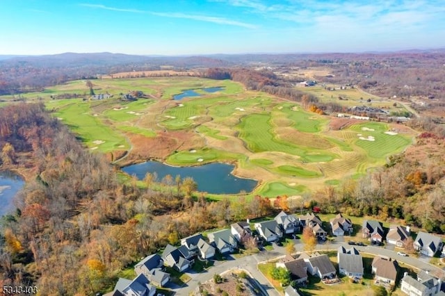 bird's eye view with a residential view, a water view, and view of golf course