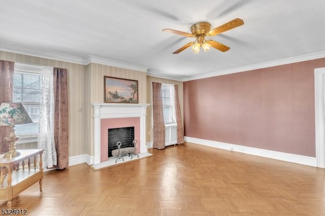 unfurnished living room with a fireplace with flush hearth, a ceiling fan, baseboards, and ornamental molding