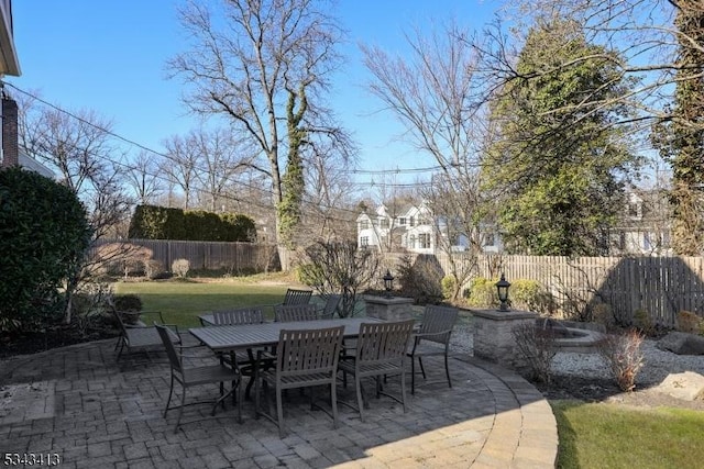 view of patio / terrace featuring outdoor dining area and fence private yard