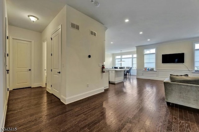 living room with recessed lighting, visible vents, baseboards, and dark wood-style floors