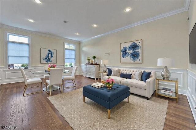 living room with recessed lighting, dark wood-type flooring, wainscoting, and crown molding