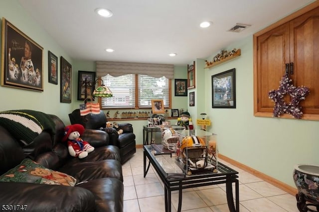 living room featuring visible vents, light tile patterned flooring, recessed lighting, and baseboards