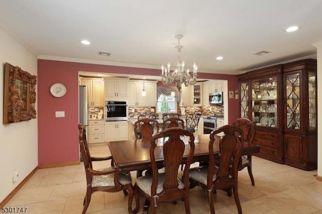 dining space featuring visible vents, crown molding, and baseboards