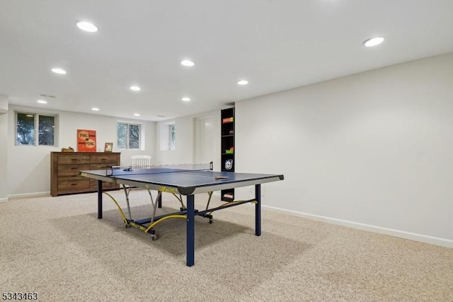 game room with recessed lighting, light colored carpet, and baseboards