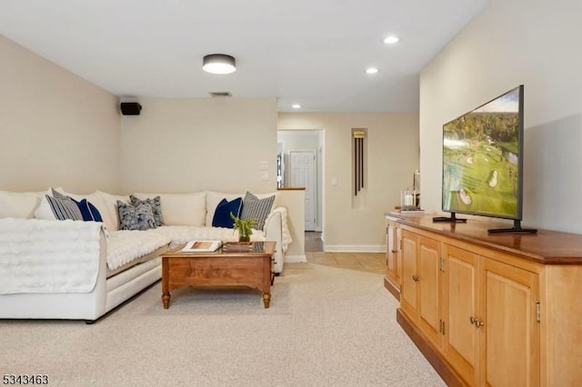 living area featuring light carpet, visible vents, recessed lighting, and baseboards