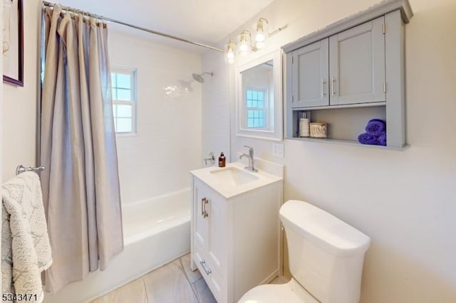 full bath with shower / bath combination with curtain, toilet, and vanity