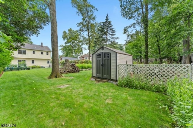 106 Chincopee Ave, Hopatcong Boro, NJ 07843 - view of yard with a storage shed
